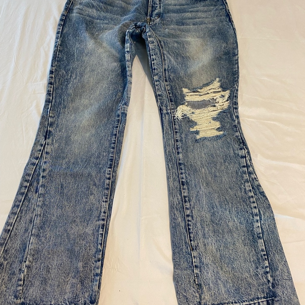 Distressed Blue Jeans